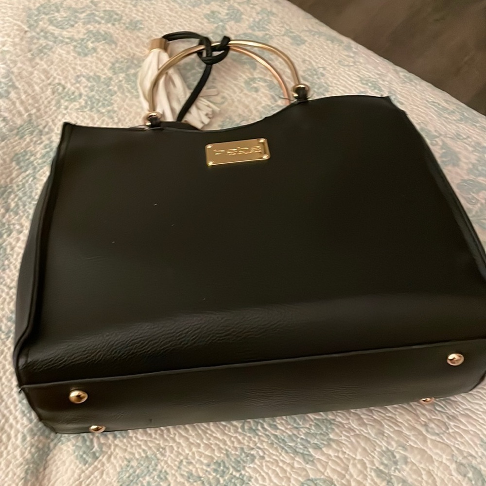 Design babe black and Whig hot and gold has pockets  good material